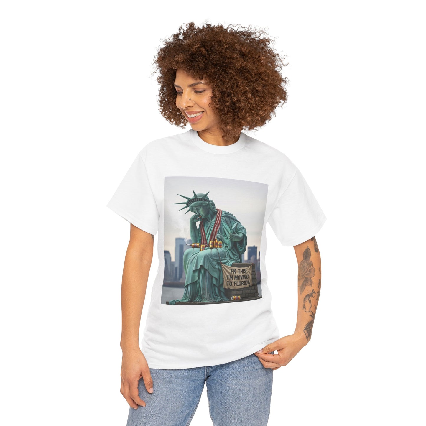 Funny T-Shirt features a playful design of the Statue of Liberty wanting to leave to Florida